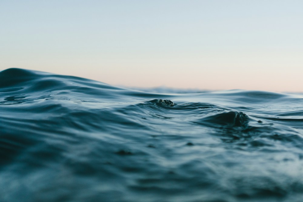 Gentle ocean waves beneath an open sky